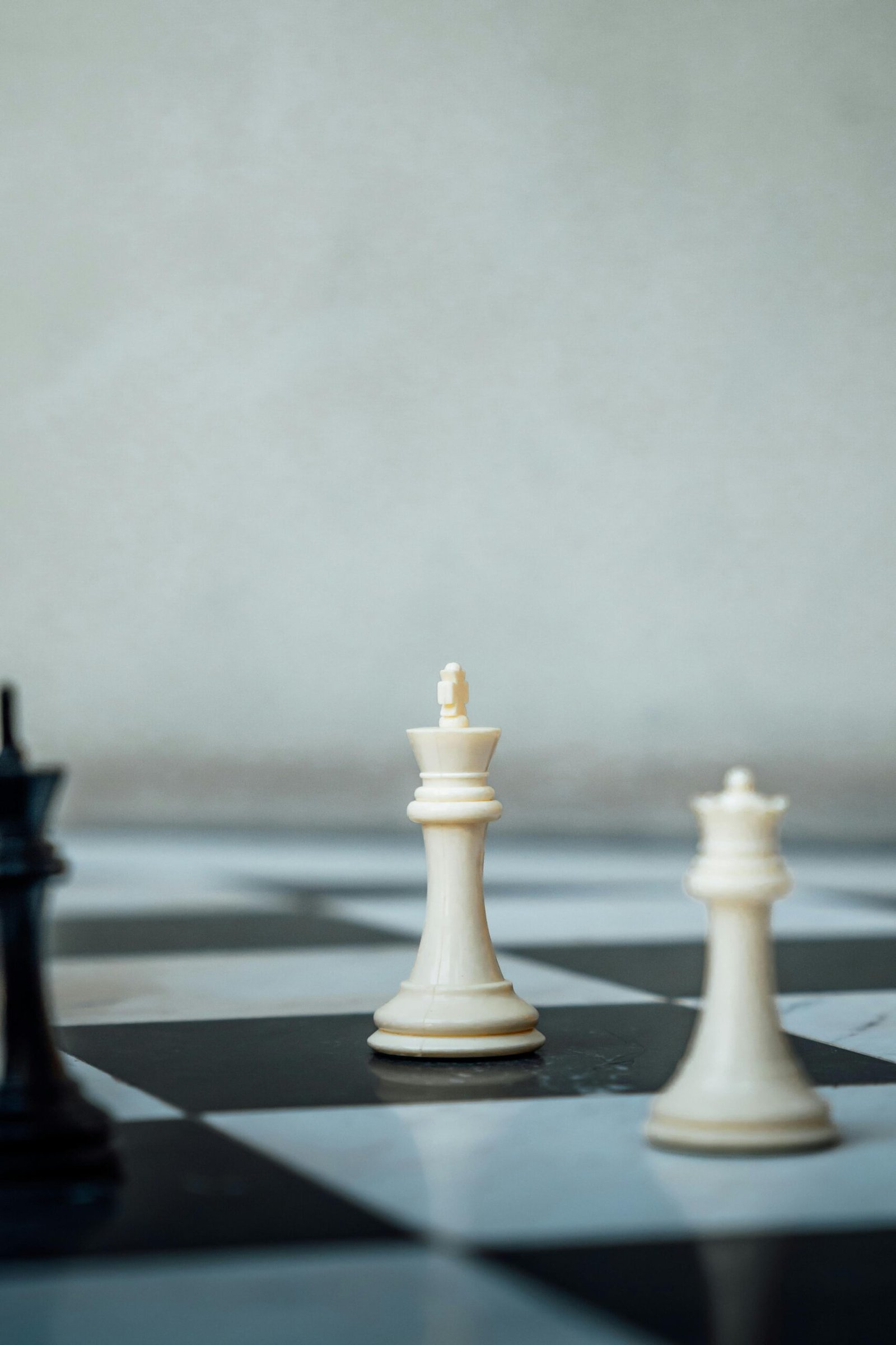 Chess pieces on a checkered board representing strategic gameplay in Ciudad de México.